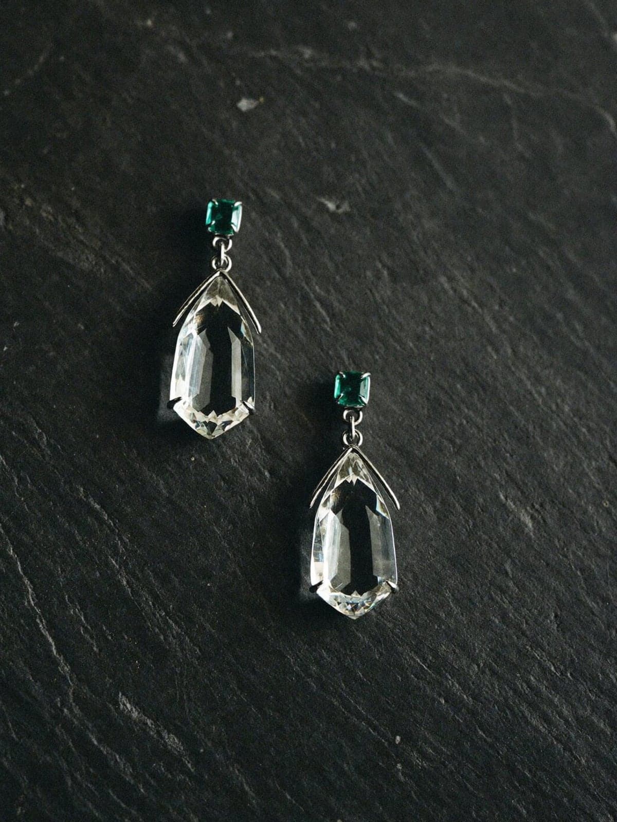 Solstice earrings, rock crystal and emerald in platinum