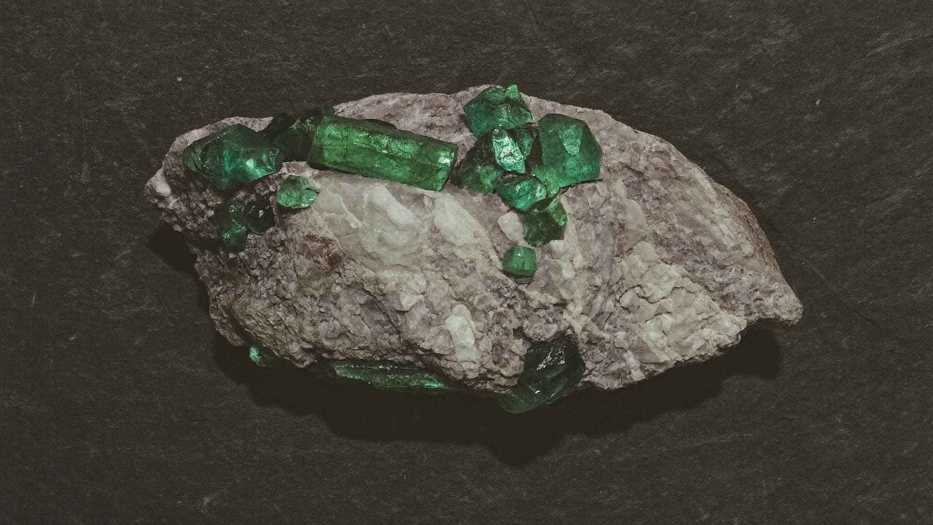 Rough emerald crystals in matrix